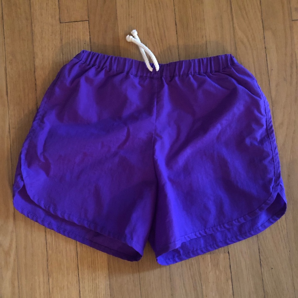 Nico Nico purple retro dolphin running shorts 10